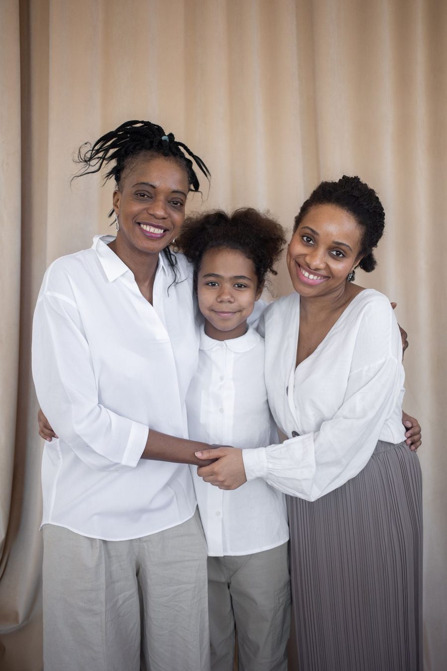 A mother sharing a supportive moment with family.