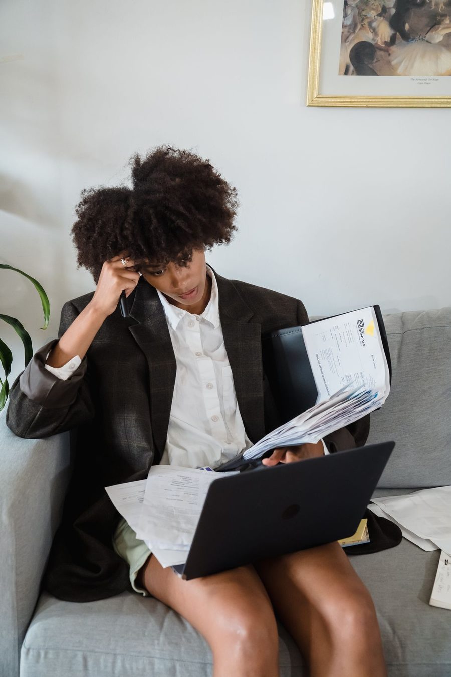 A busy woman juggling work and everyday tasks.