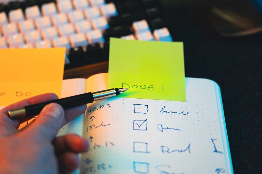 A checklist with a completed task marked done.
