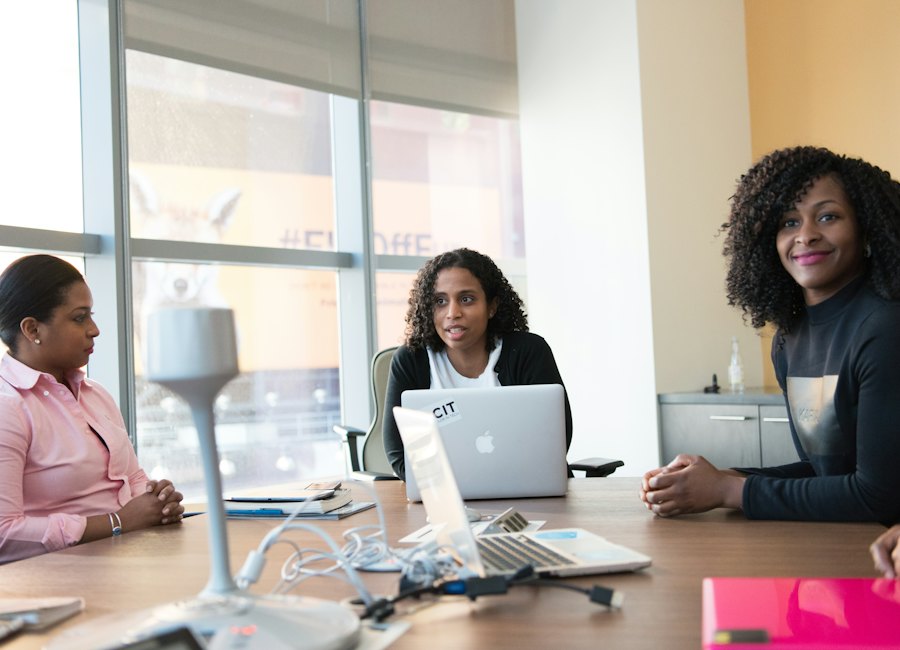 Brown women collaborating on a business project